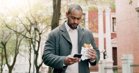 Business, man and phone with food for travel in city, browsing social media and lunch break. Male person, reading and mobile with healthy meal, direction search and notification update for urban trip