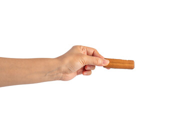 Chocolate bar in hand on transparent background