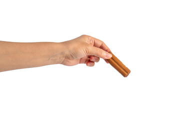 Chocolate bar in hand on transparent background