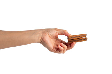 Chocolate bar in hand on transparent background