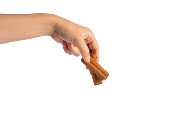 Chocolate bar in hand on transparent background