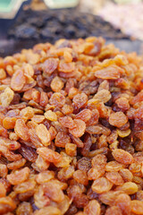 Dried yellow raisins displayed at local market
