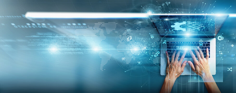 Business strategist using a laptop with enterprise transformation data strategy analysis, workflow optimization, cultural adaptation, digital modernization, and operational innovation.