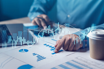 Business growth, businessman analyzing financial sales data, economic growth graph and digital accounting report technology. Financial investment concept, business growth.