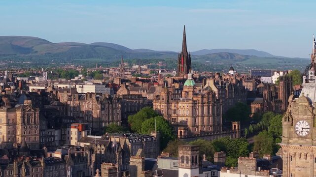 A smooth parallel drone flight capturing the traditional buildings of Edinburgh&rsquo;s Old Town and ending with a stunning reveal of the Balmoral Clock Tower
