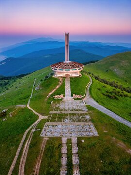Buzludzha Monument drone view of the mountains at sunset in Bulgaria