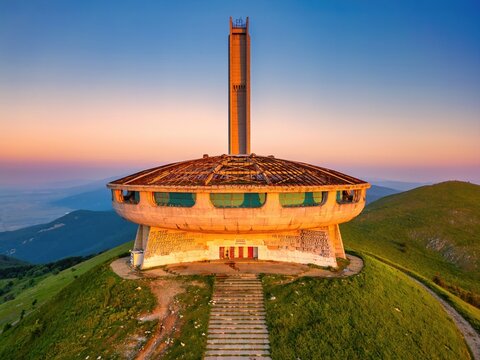 Buzludzha Monument drone view of the mountains at sunset in Bulgaria