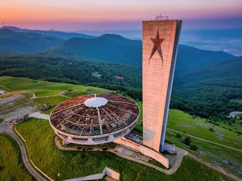 Buzludzha Monument drone view of the mountains at sunset in Bulgaria