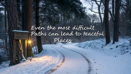 Inspirational quote on a snowy winter road through a peaceful forest.