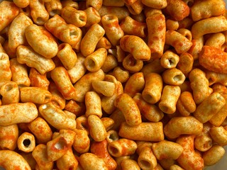 Kerupuk Makaroni Pedas or spicy macaroni cracker. Popular Snack in Indonesia