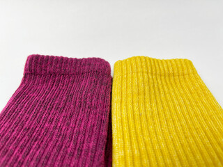 Close-up of maroon and yellow socks