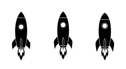Three identical black rocket ship silhouettes with glowing circular windows and fiery exhaust plumes ascending against a white background representing space travel and innovation silhouette