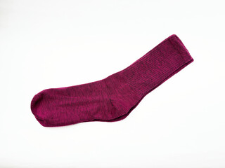 Red or maroon sock on a white background