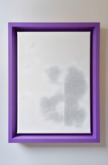 A vibrant, empty rectangular purple picture frame subtly highlighting a textured white canvas with abstract gray scribbled patterns