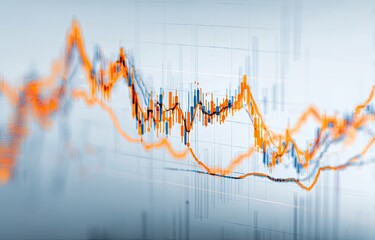 Close-up of financial charts with fluctuating lines and data points
