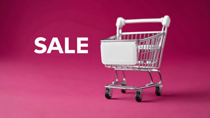 Shopping cart on pink background with 'Sale' text