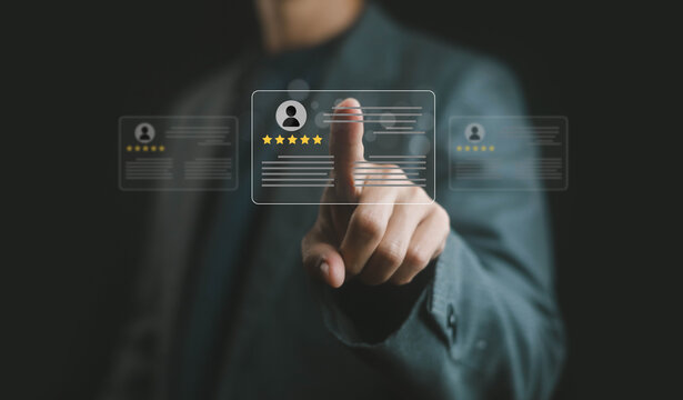 Businessman hand selecting five star customer review profile on virtual screen, concept of client feedback, service rating, online reputation, quality assurance, 
