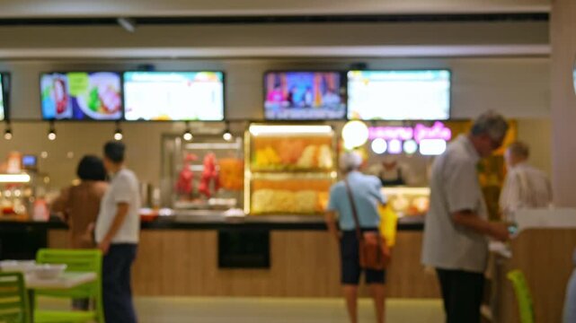 Blurred food court or cafeteria background in hospital, shopping mall, school or university - soft focus dining area for institutional facility backdrop.