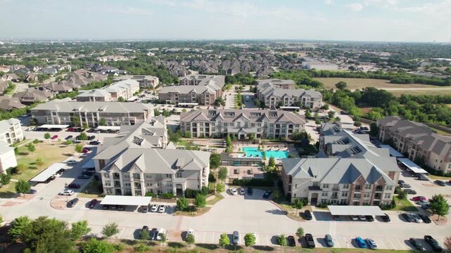 Aerial footage of the Atherton apartment complex in Frisco, Texas located at 8655 Brookhollow Blvd, Frisco, TX 75034. Camera pans left to right.