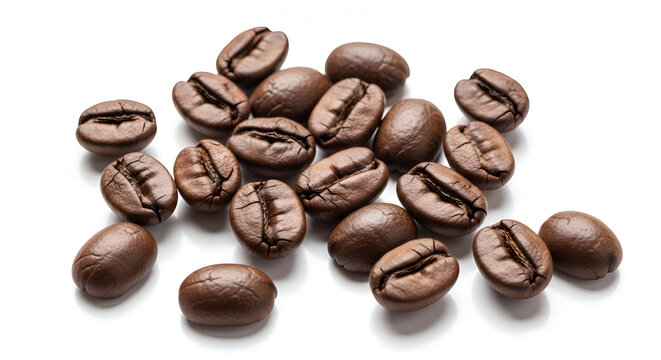 A handful of roasted coffee beans scattered on a clean white background.