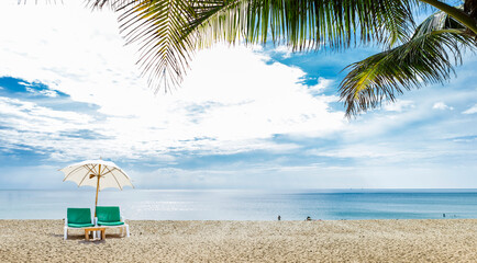 Beach chair on tropical beach, relaxing by the sea, peaceful beach in sunny summer, tropical island in south of Thailand