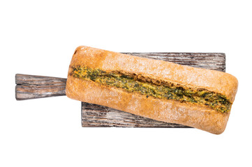 Garlic bread with herbs on wooden cutting board isolated on white background