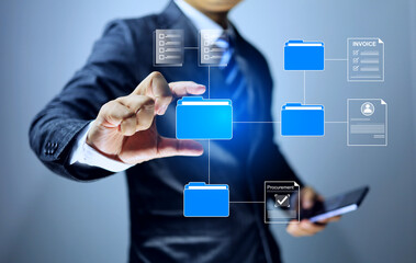 document management concept with businessman catch on virtual folder to find sub folders and document keep inside represent to paperless and digital file in cloud storage