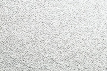 Close-up of a textured, off-white surface
