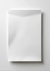 Blank white paper, creased and slightly warped, on a white background