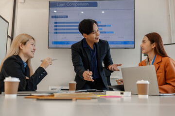 one of marketing team is explaining the presentation to the team, group of businessman are meeting in the office, these entrepreneur are brainstorming about their business project, finance, accounting