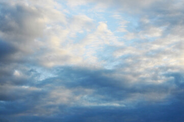 Beautiful storm clouds on a summer night with pinks and blues.