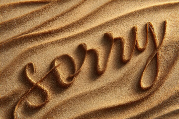 Writing 'sorry' in fine sand on a beach at sunset creates a heartfelt gesture of apology and reflection Generative AI