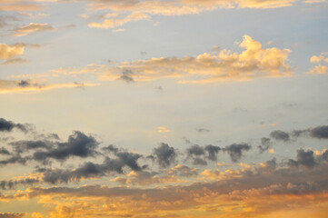 Beautiful storm clouds on a summer night with pinks and blues.
