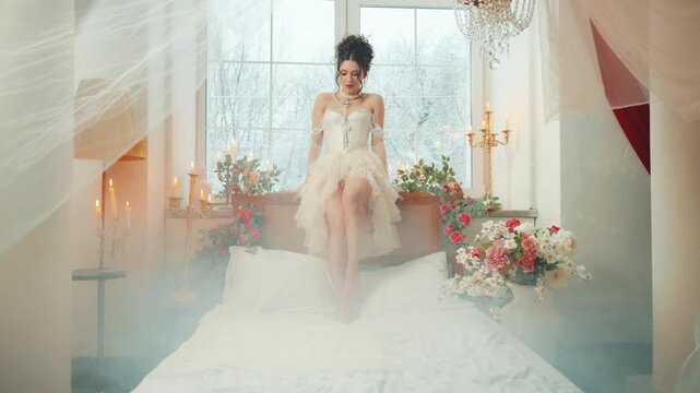 Glamour sexy girl princess fashion model posing on bed beauty face. lady hand in long gloves stroking body leg skin. Fantasy woman queen, white room Victorian old style Baroque era vintage dress 4k