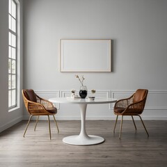 Contemporary dining area showcasing a round white pedestal table and two wicker chairs with leather accents, bathed in natural light.