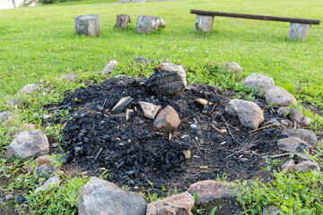 Obraz premium Extinguished Campfire in a Stone Circle