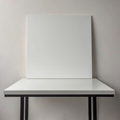 A minimalist  setup featuring a blank white surface against a neutral backdrop.