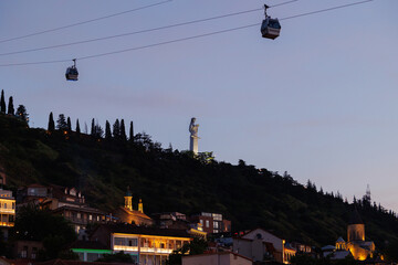 Night view of the Mother of Georgia statue on Narikala Hill viewed from the Kura River in Tbilisi, Georgia © hyserb