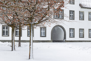 Historic abbey in a quiet winter landscape