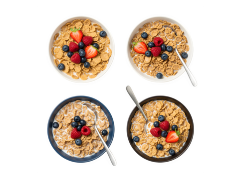 A top view of bowls filled with breakfast cereal, milk, and berries, all set against a white background.