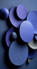Abstract composition of various sized circles and spheres in shades of purple and gray, on a dark background