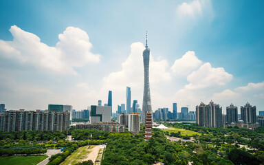 Fototapeta premium Guangzhou China architecture shows modern city buildings and a tall tower in Zhujiang New Town.