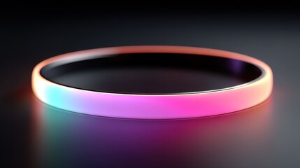 Colorful gradient ring on a sleek surface, showcasing modern design with soft lighting effects
