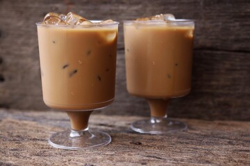 Iced coffee on wood background