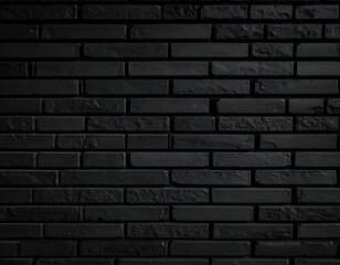 Fototapeta premium Dark, uniformly-colored brick wall texture