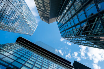 Skyscrapers in Frankfurt financial district, architecture symbolizing finance, business identity, economy, global investment and corporate development in urban context