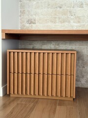 wooden chest of drawers in the living room