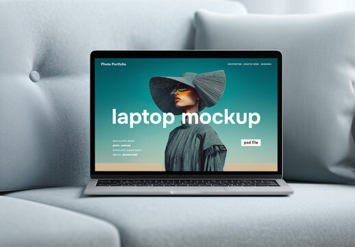 Laptop mockup in home interior on sofa