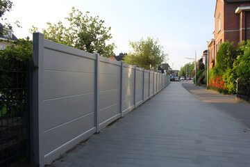 Modern Soundproof Fence with Acoustic Panels Blending into Residential Urban Design