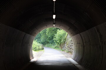 View along a pedestrian and cycle tunnel on a disused railway line